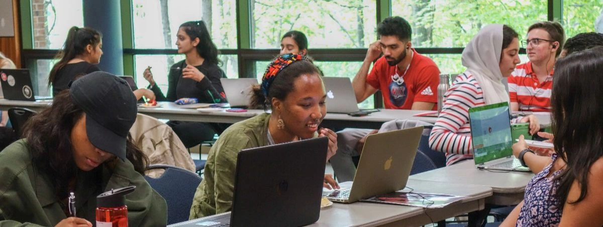 IRW Students working on laptops in class